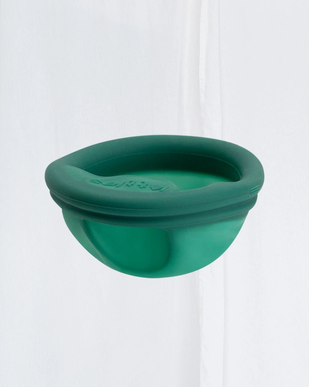 Herbruikbare menstruatiedisc met flexibele rand en geïntegreerde Seal-filter